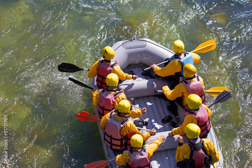 rafting boat colors people rowing in Arahthos river Arta Greece