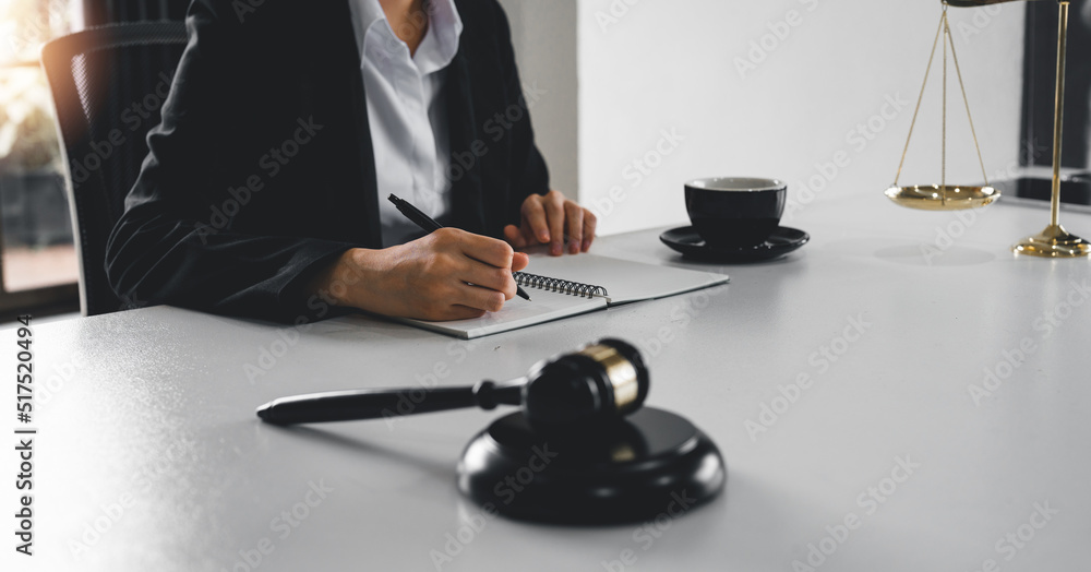 Judge gavel with Justice lawyers, Business woam in suit or lawyer working on a documents. Legal law, advice and justice concept. Judge gavel with Justice lawyers, Business woam in suit or lawyer working on a documents. Legal law, advice and justice concept.