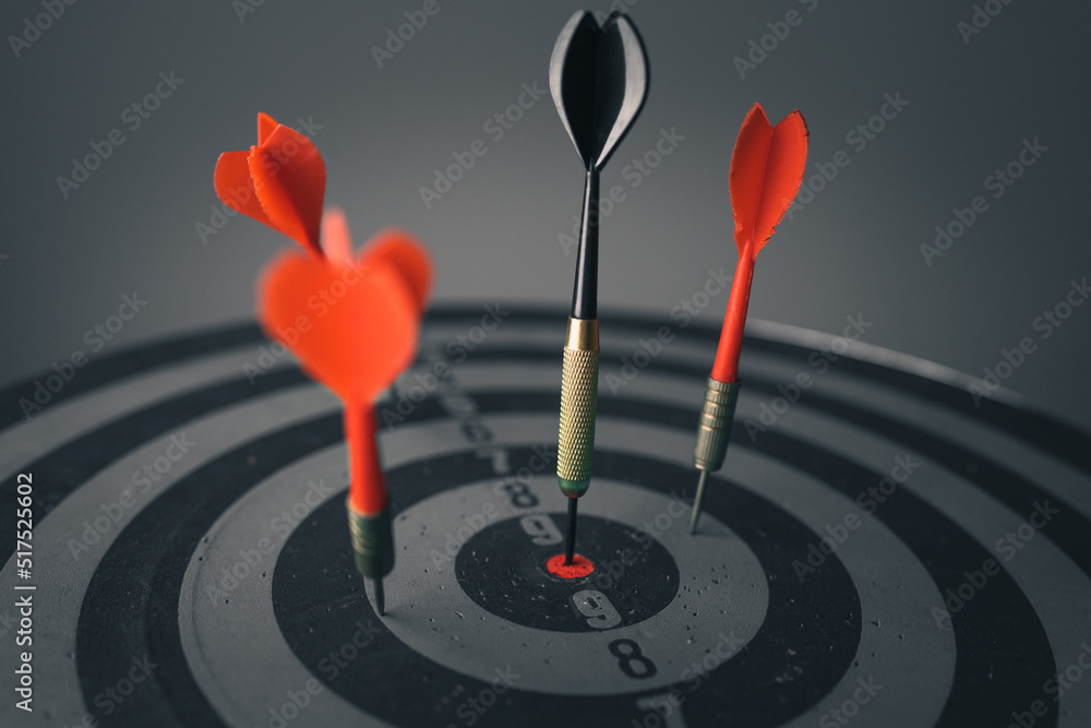 Bullseye is a target of business. Dart is an opportunity and Dartboard is the target and goal. So both of that represent a challenge in business marketing as concept.	
