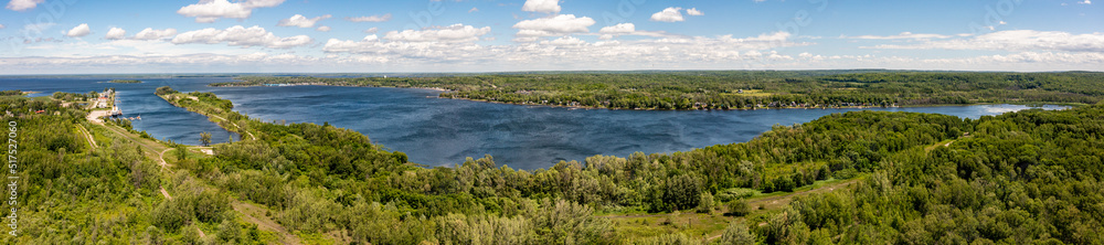 Port Mc Nicole water and clouds green trees lake blue water Port Mc Nicole water and clouds green trees lake blue water