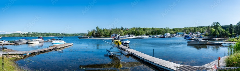 pano of  penetang and water airplane during sunset with boatyard  highland point, with blueand sky 