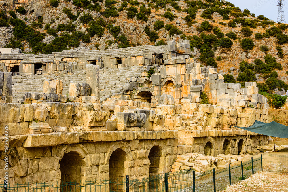 Obraz premium Ruins of the ancient roman or greek theatre in town Demre. Ancient Myra city. Antalya province, Turkey