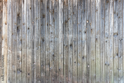 Grey barn wooden wall planking texture. hardwood dark weathered timber surface. old solid wood slats rustic shabby gray background. grunge faded wood board panel structure, close up