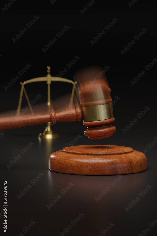 Wooden gavel striking against a sound block. Motion blur. Justice concept. Wooden gavel striking against a sound block. Motion blur. Justice concept.