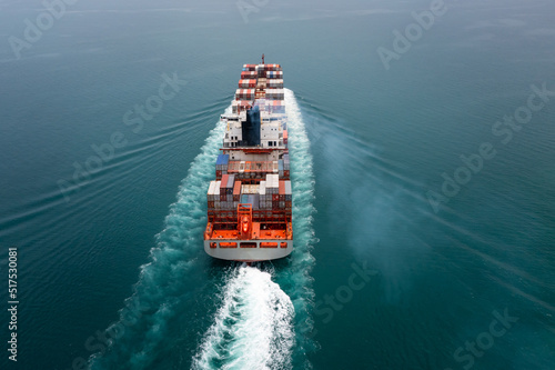cargo container ship sailing in sea import and export business and industry logistic goods transportation of international by container ship in ocean fright aerial view