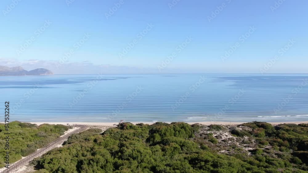 Playa de Muro panoramic view of a beach on the seacoast of Majorca with an amazing turquoise sea,. Concept of summer, travel, relax, hotel, holiday and enjoy Playa de Muro panoramic view of a beach on the seacoast of Majorca with an amazing turquoise sea,. Concept of summer, travel, relax, hotel, holiday and enjoy