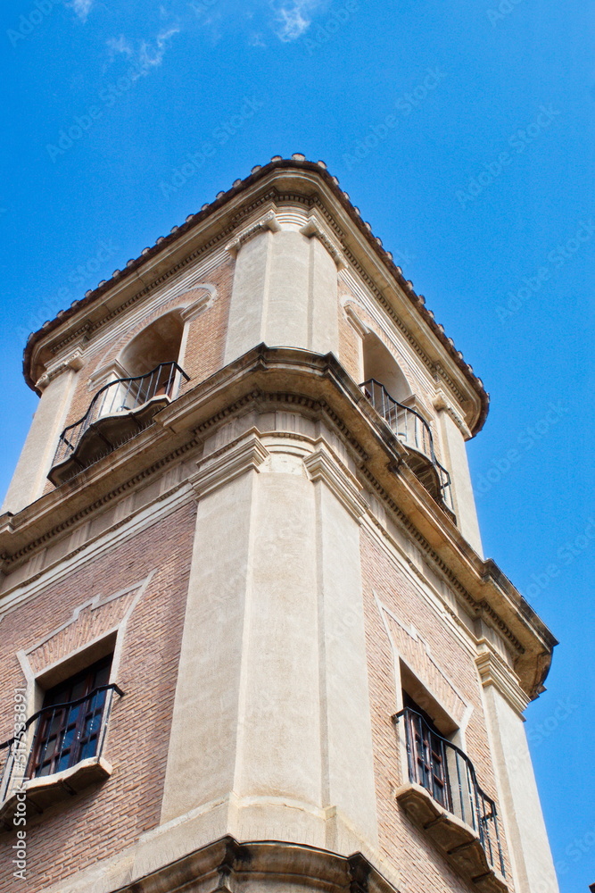 Beautiful high tower with bell tower in the baroque church of Santa Eulalia in Murcia	
