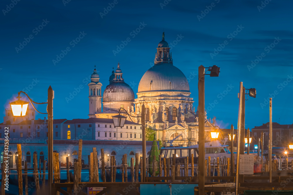 The beautifully illuminated Basilica Santa Maria della Salute in Venice, Italy 