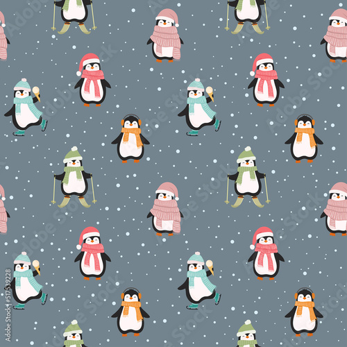 Christmas seamless pattern with cute cartoon penguins and snowflakes. Flat style.