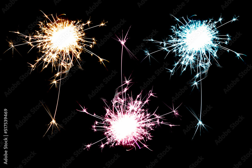 Sparkling sparkler on a black background. Fireworks, stars, flashes of light. Pyrotechnics. The concept of the holiday. Christmas, New Year. Explosion. An element for design. Bengal fire