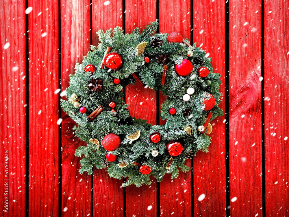 Christmas wreath on the background of a wooden wall. A wreath of ...