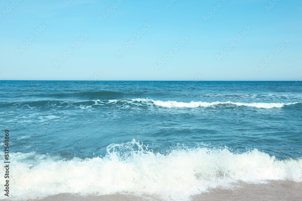 Picturesque view of beautiful sea and blue sky on sunny day Picturesque view of beautiful sea and blue sky on sunny day