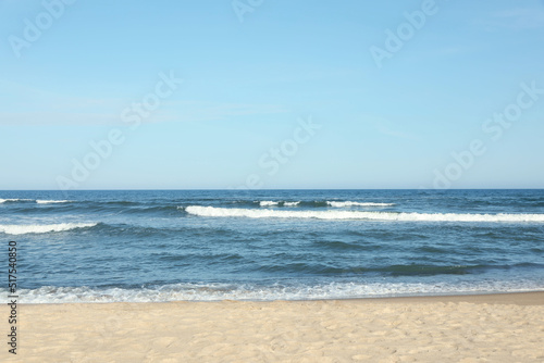 Fototapeta Naklejka Na Ścianę i Meble -  Picturesque view of beautiful sea and sandy beach on sunny day