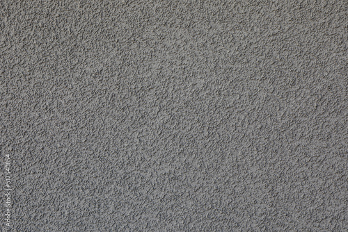 Texture of grey plaster wall as background