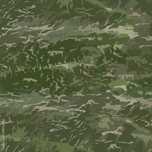 Seamless texture military camouflage repeats army green hunting. © svetenergy