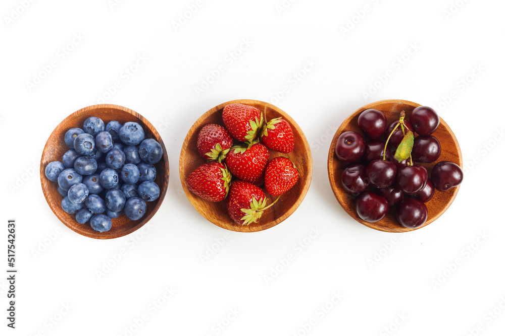 Berries mix in in a bowls on white background Berries mix in in a bowls on white background