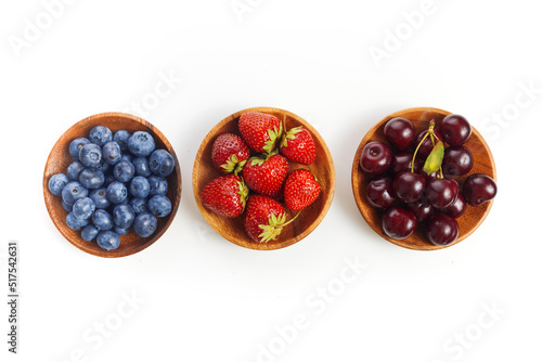 Berries mix in in a bowls on white background