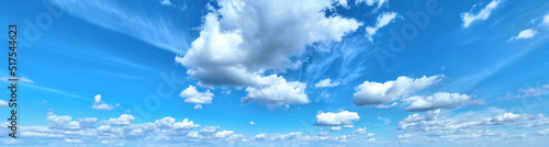 White clouds against blue sky background © Piotr Krzeslak