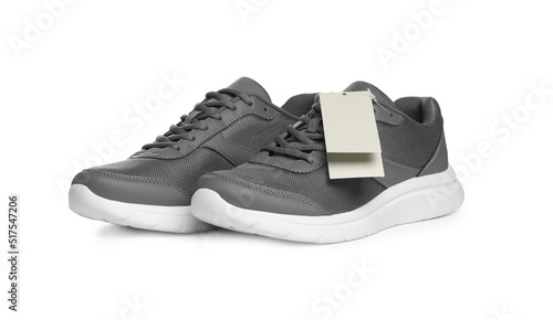 Pair of stylish sport shoes on white background