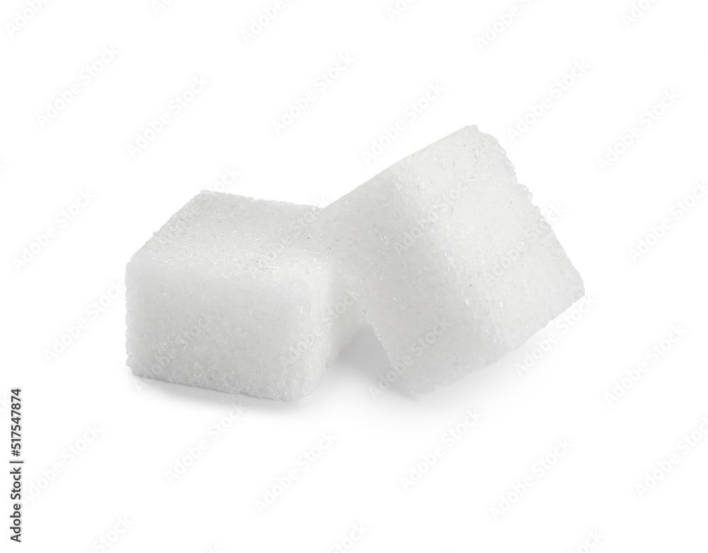 Two cubes of refined sugar isolated on white Two cubes of refined sugar isolated on white