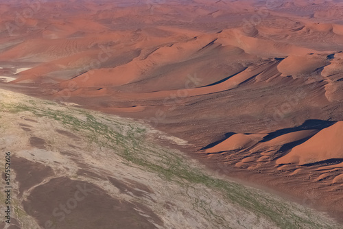 Namibia, aerial view of the Namib desert, wild landscape, panorama in rain season
