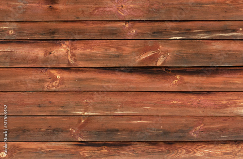 Old Weathered Natural Log Cabin Aged Wall Facade Texture. Rustic Log Wall Horizontal Brown Background. wide horizontal wooden planks