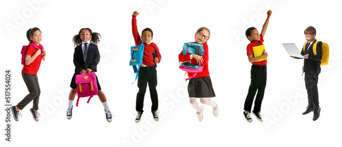 Set of funny jumping schoolchildren on white background