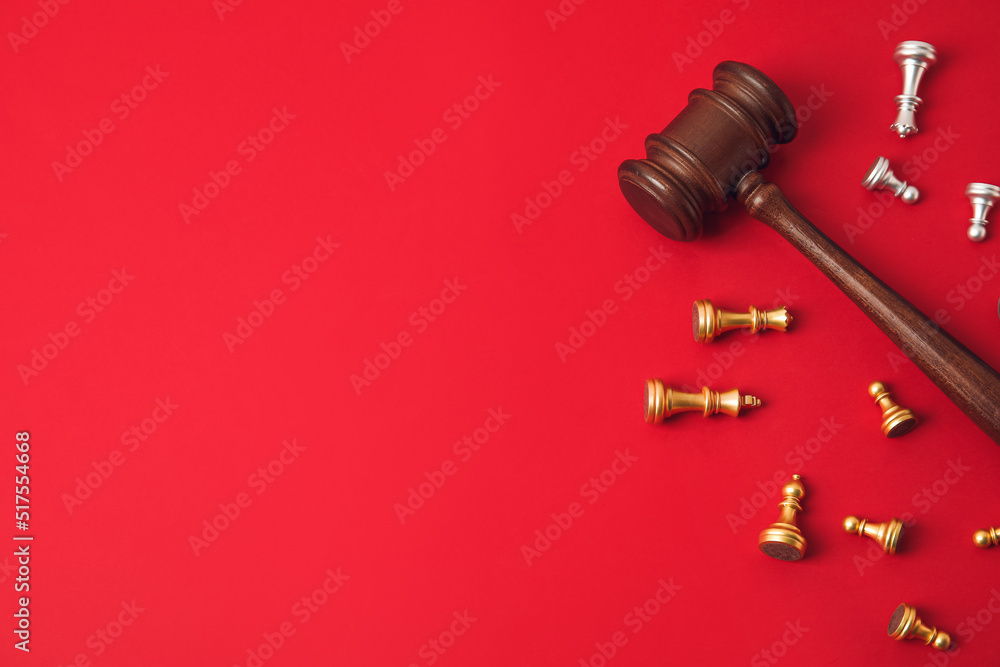 Judge gavel and chess pieces on color background Judge gavel and chess pieces on color background