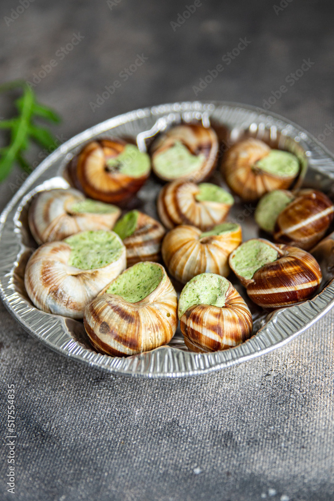 snails green garlic oil fresh healthy meal food snack on the table copy space food background rustic top view snails green garlic oil fresh healthy meal food snack on the table copy space food background rustic top view
