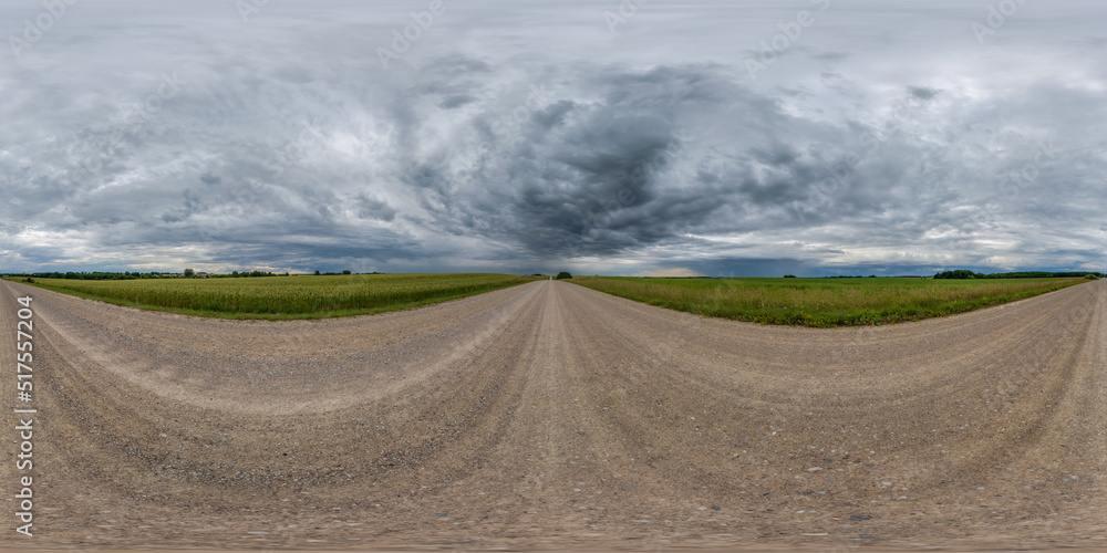 full seamless spherical hdri 360 panorama view on no traffic gravel road among fields with awesome clouds in overcast storm sky in equirectangular projection, ready for VR AR full seamless spherical hdri 360 panorama view on no traffic gravel road among fields with awesome clouds in overcast storm sky in equirectangular projection, ready for VR AR