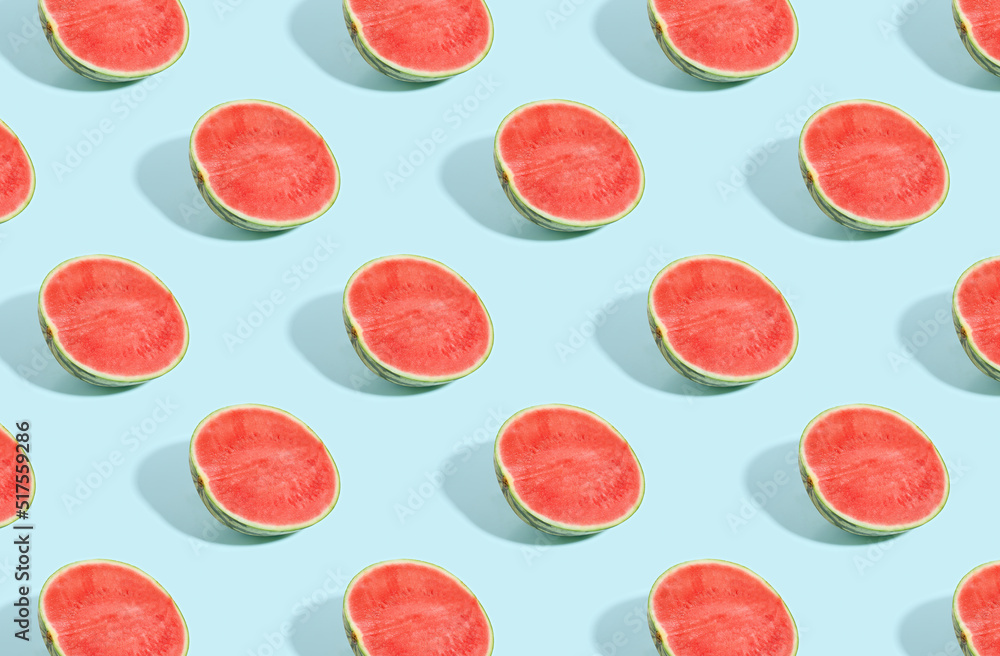 Pattern of cut watermelon on blue pastel background Pattern of cut watermelon on blue pastel background