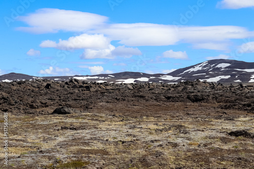 The volcanic landscape around Leirhnjukur volcano in Iceland - sulphur, rocks and wasteland. photo