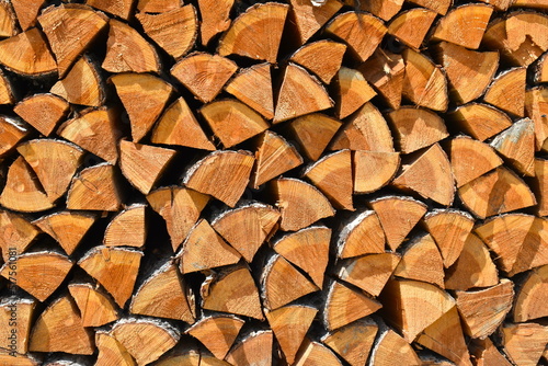 Stack of wood finely chopped in a Canadian mountain resort. The forest sector is major for Canada's economy It is source of income for many It manufactures paper for printing and writing panels lumber