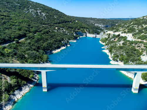 Aerial view on blue lake Sainte-Croix-du-Verdon  road bridge and cliffs  tourists destination in France