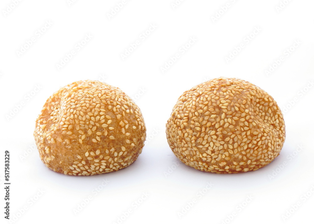 Deep-fried dough ball with sesame and mashed beans inside on white background Deep-fried dough ball with sesame and mashed beans inside on white background
