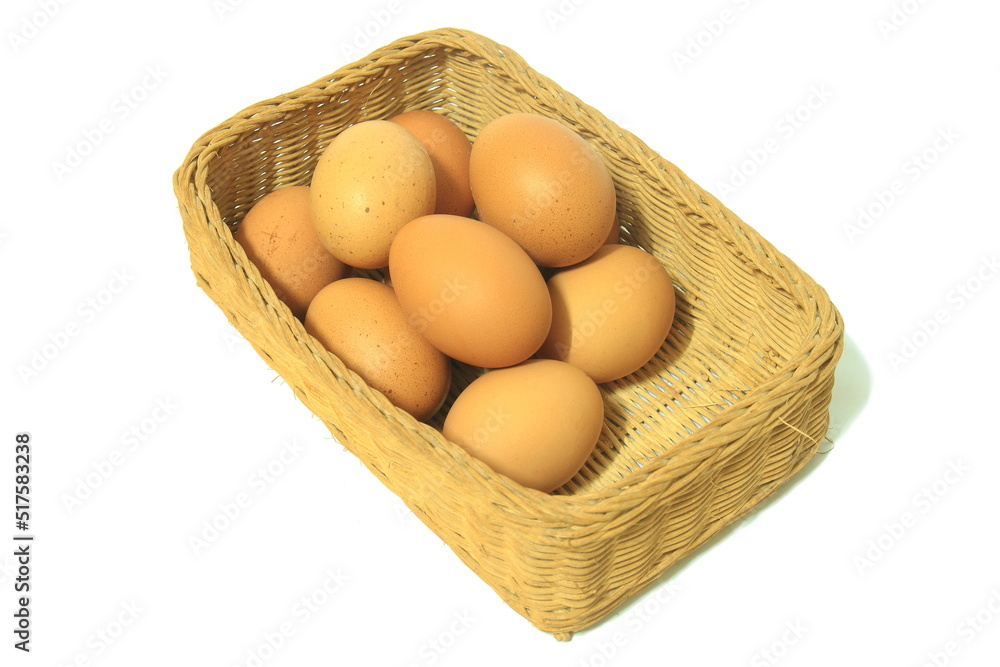 Eggs in basket isolated on white background Eggs in basket isolated on white background