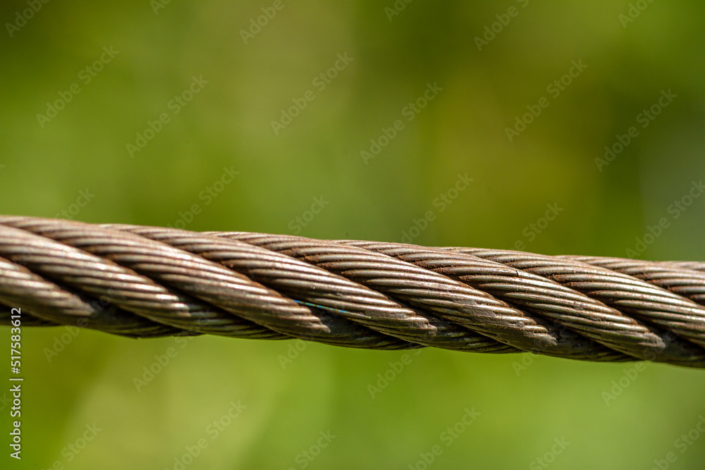 Close up Steel wire used as a retaining rope on a suspension bridge Close up Steel wire used as a retaining rope on a suspension bridge