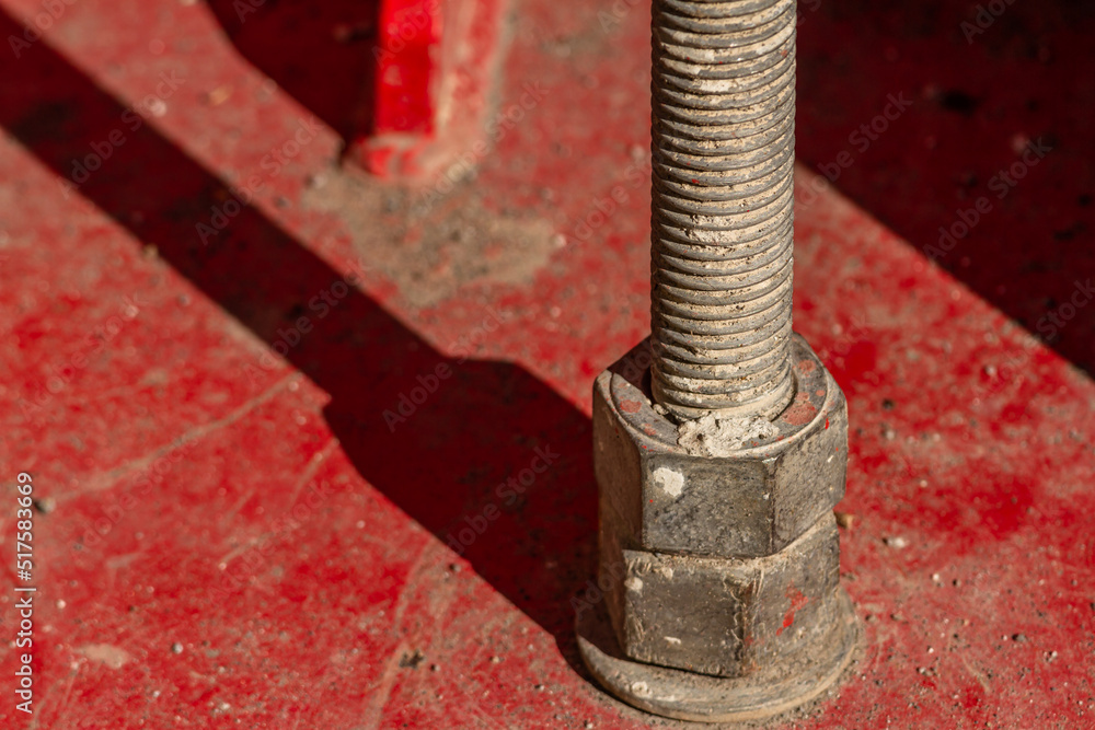 CLose up Nuts and bolts used to strengthen plate connections on a bridge CLose up Nuts and bolts used to strengthen plate connections on a bridge