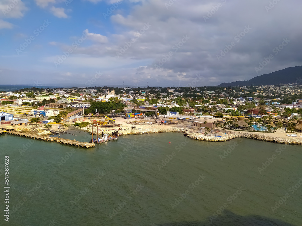 Ships, boats, containers, Puerto Plata harbor, port and cityscape of the industrial zone, Dominican Republic