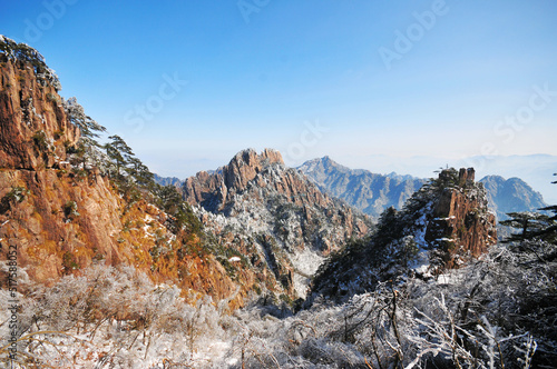 Mountain landscape after heavy snowfall, trees covered with snow and rime, China, Anhui Province, Mount Huang