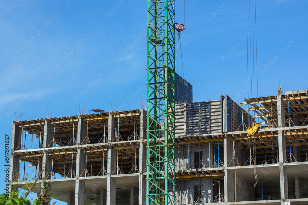 Construction site with crane and building