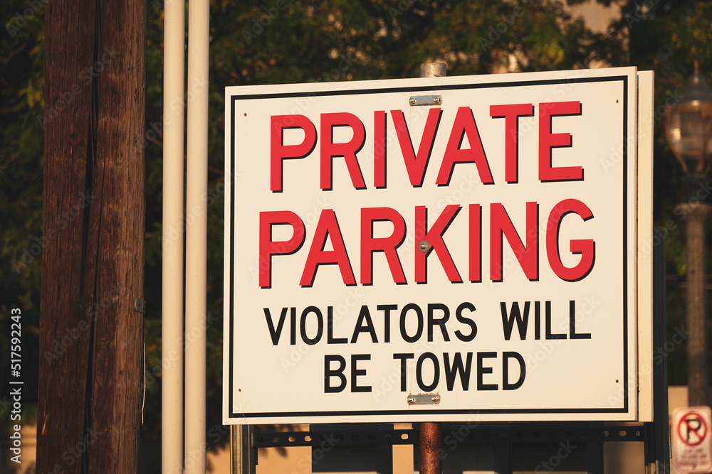 Private parking violators will be towed sign Private parking violators will be towed sign