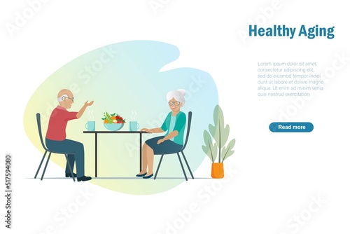 Healthy aging  senior care concept. Happy elderly couple drinking and talking at table.