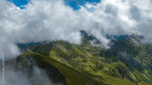 aerial view of mountains with clouds 