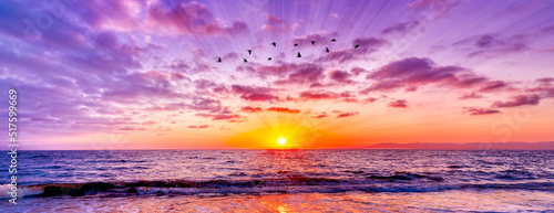Fotografiet Sunset Birds Flying Inspirational Ocean Sun Ray Banner