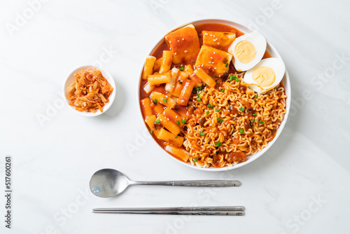 Korean instant noodles with Korean rice cake and fish cake and boiled egg photo