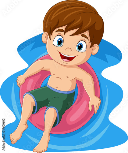 Cute little boy floating on inflatable ring