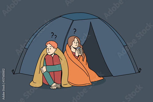 Confused man and woman sleeping in tent outside live for charity or donation. Unhappy couple refugees in camp on street. Homeless problem. Vector illustration. 