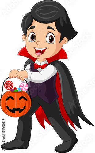 Cartoon vampire boy holding candy in a pumpkin basket