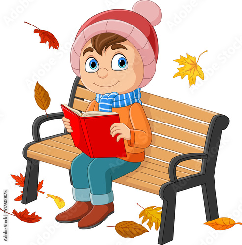 Cartoon little boy sitting at bench with reading a book
